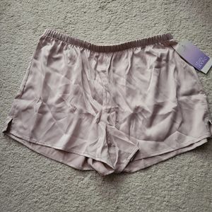 Stars above pink satin shorts xs